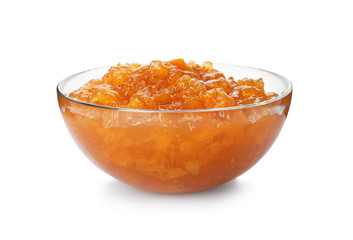 Fototapeta na wymiar Bowl with peach jam on white background