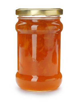 Jar with peach jam on white background