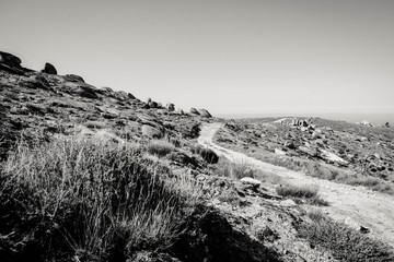 Black and white landscape of a walk through the beautiful mountains in national park in Portugal