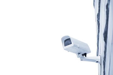 Surveillance camera on wall