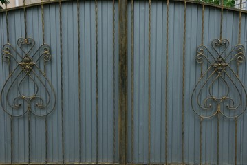 gray black metal texture from forged pattern on iron gray fence