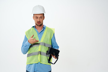 builder in a helmet with 3d glasses