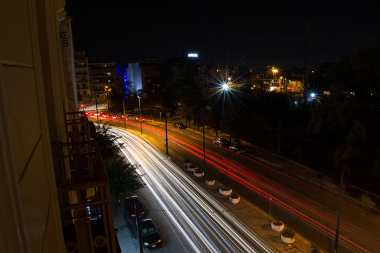 Car Headlights Forming Lines in Long Exposure Shot at Night in Athens, Greece