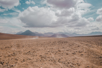 4x4 cars speeding off into the desert over the Chile border into Bolivia