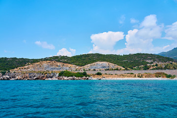 Fototapeta premium Sea coast of Alanya, Turkey and blue cloudy sky. 