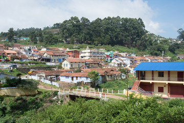 Fototapeta na wymiar View from the steam Nilgiri Mountain Railway travels between the towns of Mettupalayam and Ooty via Coonoor.