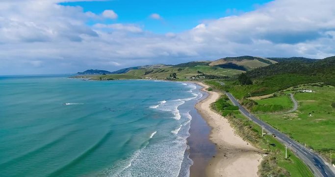 Landscape of green hills and ocean with beach. Shevelev.