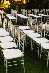 Retro empty vintage style wooden chairs for events and weddings