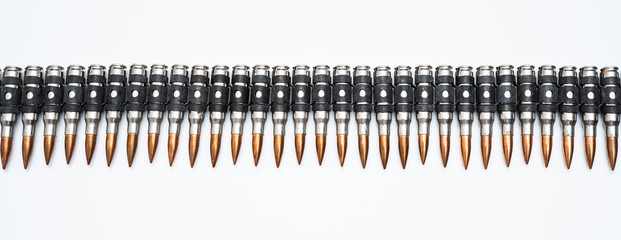 ammo belt full of bullets isolated - obrazy, fototapety, plakaty