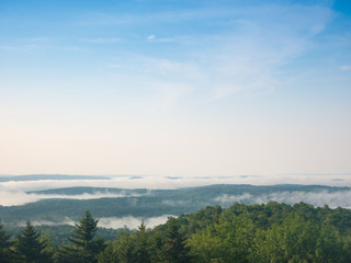 Fog over the hillside of mountain in the morning
