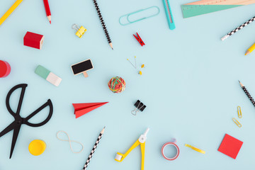 School stationery on a blue background. Creative template.