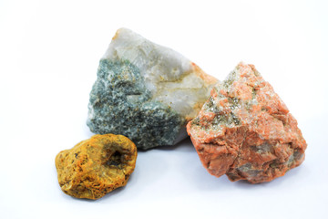different beautiful stones on a white background