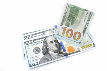 hundred dollar bills on a white background