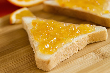 toast covered with orange jam