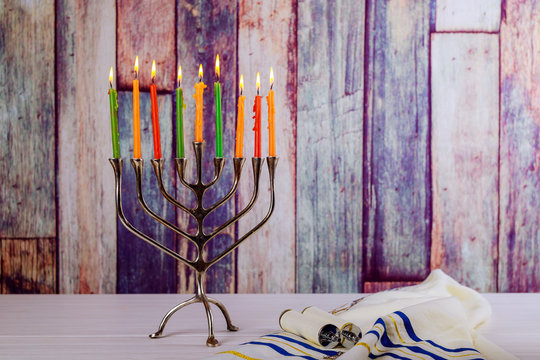 abstract retro of jewish holiday Hanukkah with menorah traditional defocused lights