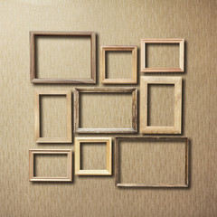 Fototapeta premium old photo frames on retro wallpaper