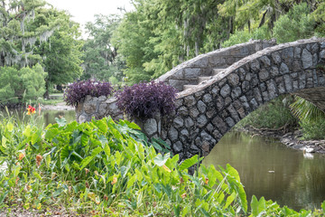 Bridge surrounded by lots of greenery