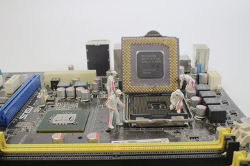 a mini engineers repairing computer  Computer repair