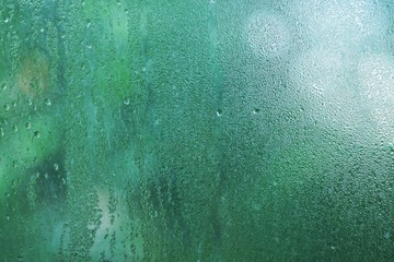 Rain drop on mirror in cloudy day, refreshing background texture