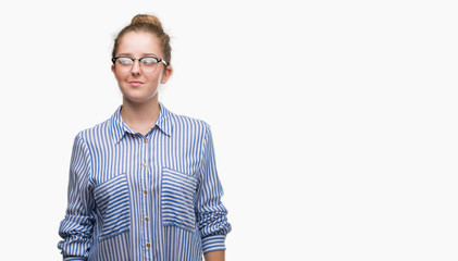 Young blonde business woman smiling looking side and staring away thinking.