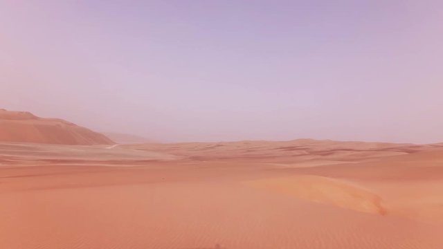 Traveling on an off-road car on the sand of Rub al Khali desert stock footage video
