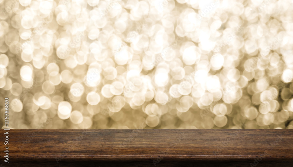 Poster empty old rustic dark wood table top with blur sparkling gold bokeh abstract background,panoramic ba