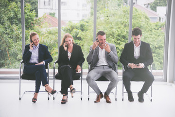 business people play a phone relaxing in break time