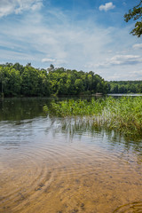 Sandy beach on sunny beautiful summer day over the lake near Bydgoszczo city, Poland