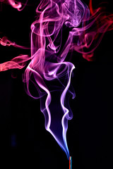 Obraz premium Colorful smoke on a black background