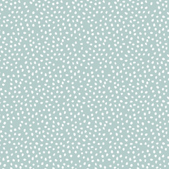 Seamless vector background with random elements. Abstract ornament. Dotted abstract light blue and white pattern