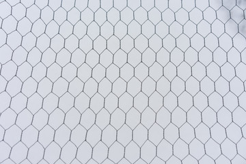 metal fence with snow background