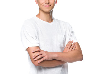 cropped image man in white shirt standing with crossed arms isolated on white
