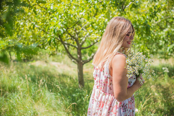 Nature, summer holidays and plus size young lady, vacation and people concept - xl woman dreaming about good life and enjoy the moment 