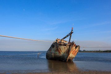 Abandoned Ship during sunset moment at sabah borneo malaysia Image has grain or blurry or noise and...