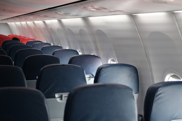 empty passenger seat inside airplane. chair in aircraft