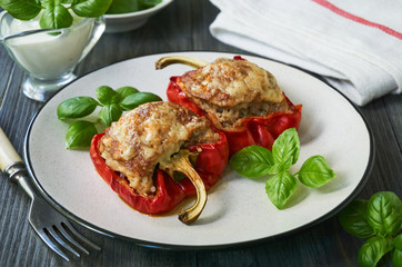 Stuffed pepper with minced meat and cheese on a plate