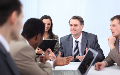 businessman holds working meeting with employees