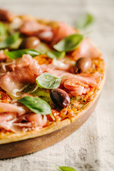 Italian pizza on rustic textile