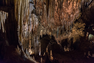 Cave of Valporquero. The Cave of Valporquero is located on the southern slope of the Cantabrian Mountains, north of the Province of León