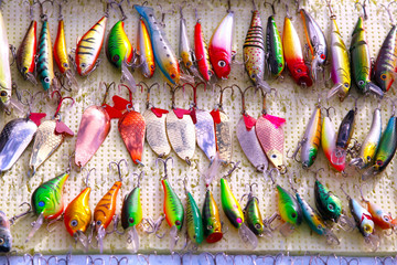 Color spoon baits, tackles and wobblers. Fishing lures and accessories
