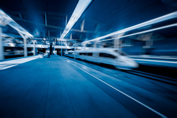 high-speed rail arriving at station