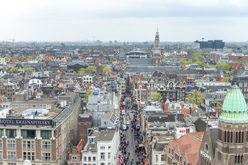 Obraz premium AMSTERDAM, THE NETHERLANDS - MARCH 2015: Aerial view of city buildings. The city hosts 15 million tourists annually
