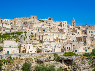 Obraz premium Panoramiczny widok na Sassi di Matera, prehistoryczne centrum historyczne, wpisane na Listę Światowego Dziedzictwa UNESCO, Europejska Stolica Kultury 2019 (szeroki)