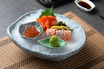 assorted sashimi sushi on shaved ice