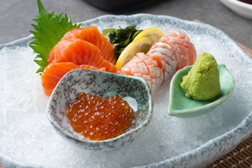 assorted sashimi sushi on shaved ice