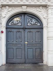 Vintage fretted wooden door. Augsburg, Germany.
