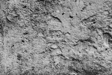 Wall fragment with scratches and cracks