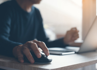 Man working on laptop computer