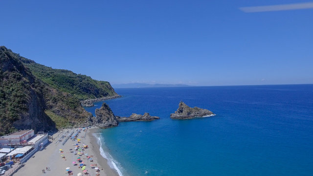 Tonnara Beach in Palmi, Calabria. Panoramic sunset aerial view in summer season