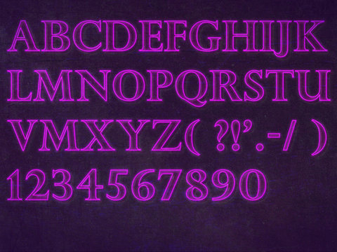 neon purple light letters font on forest dark background
